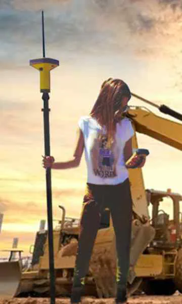 Spanish-American-Woman-Conducting-a-Site-Survey, She is standing in front of a bull dozer on a summer day